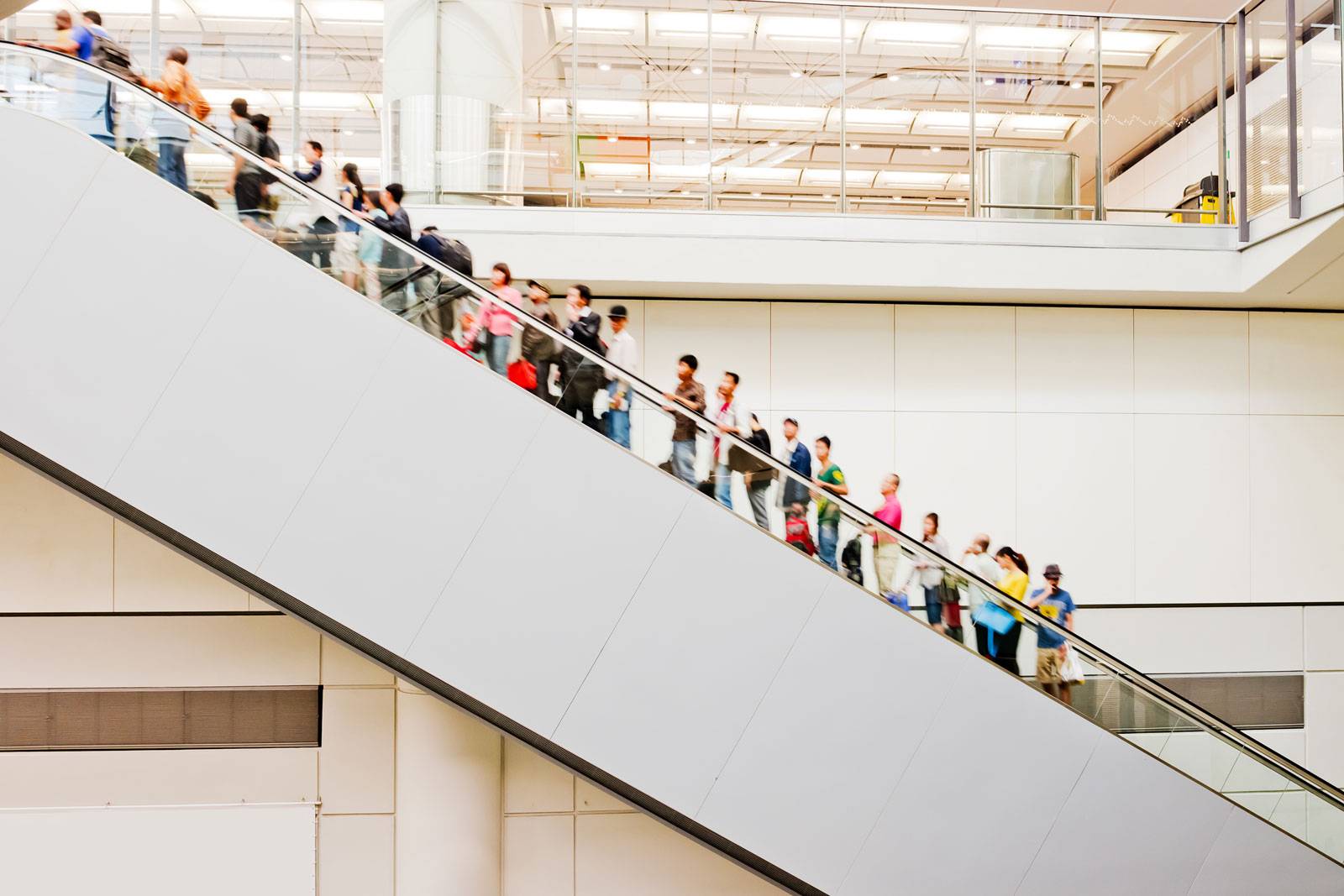 Customers in an escalator
